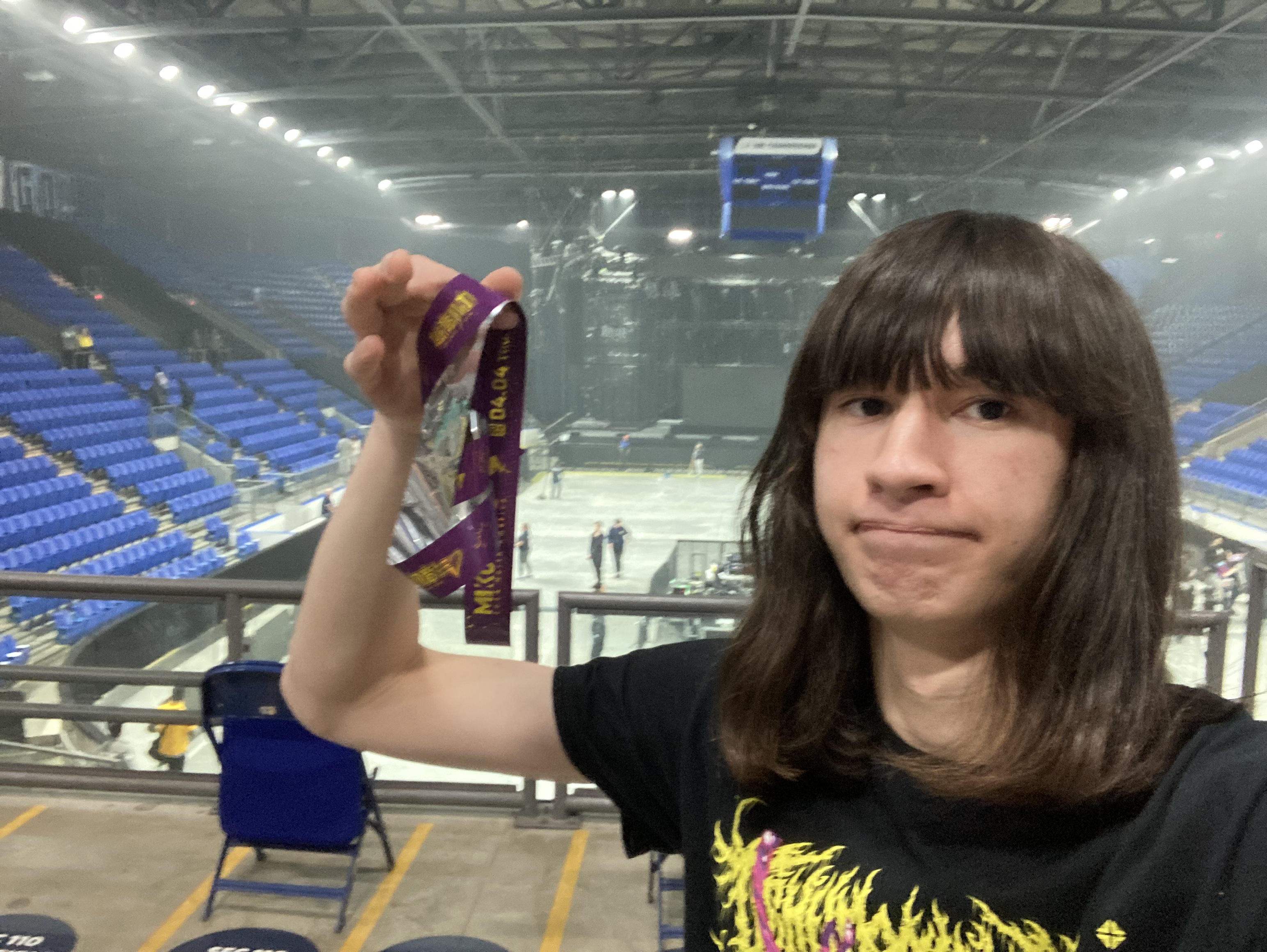 Me holding the purple ribbon